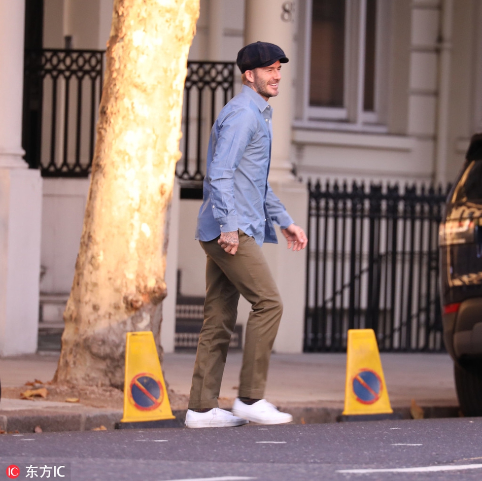 贝克汉姆英伦风搭配笑容满面