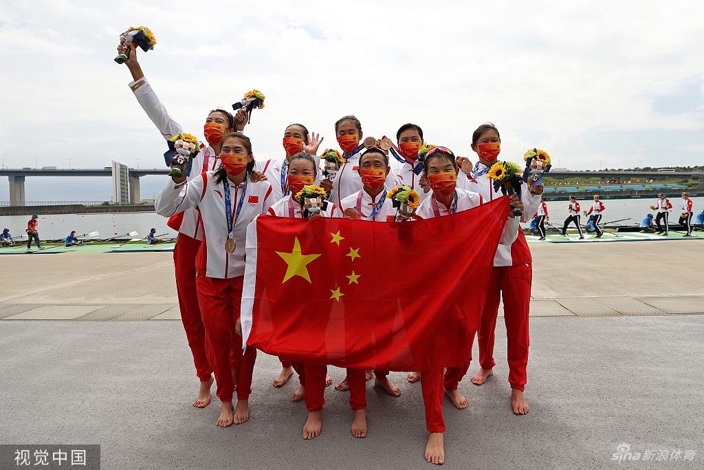 中国红!奥运健儿与五星红旗交相辉映