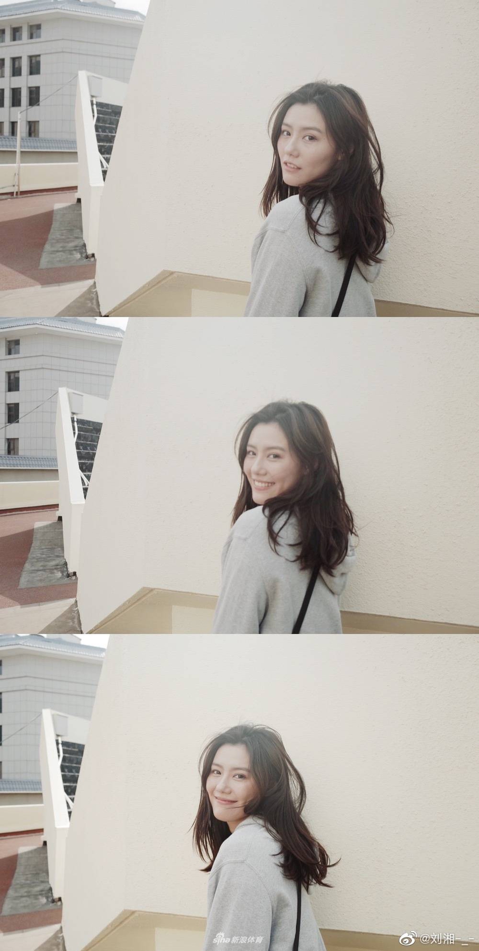 游泳女神刘湘晒美照 回眸一笑令人心动