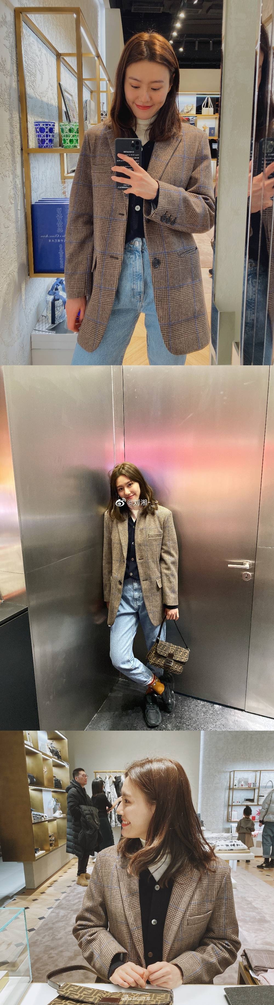 游泳女神刘湘晒美照 回眸一笑令人心动