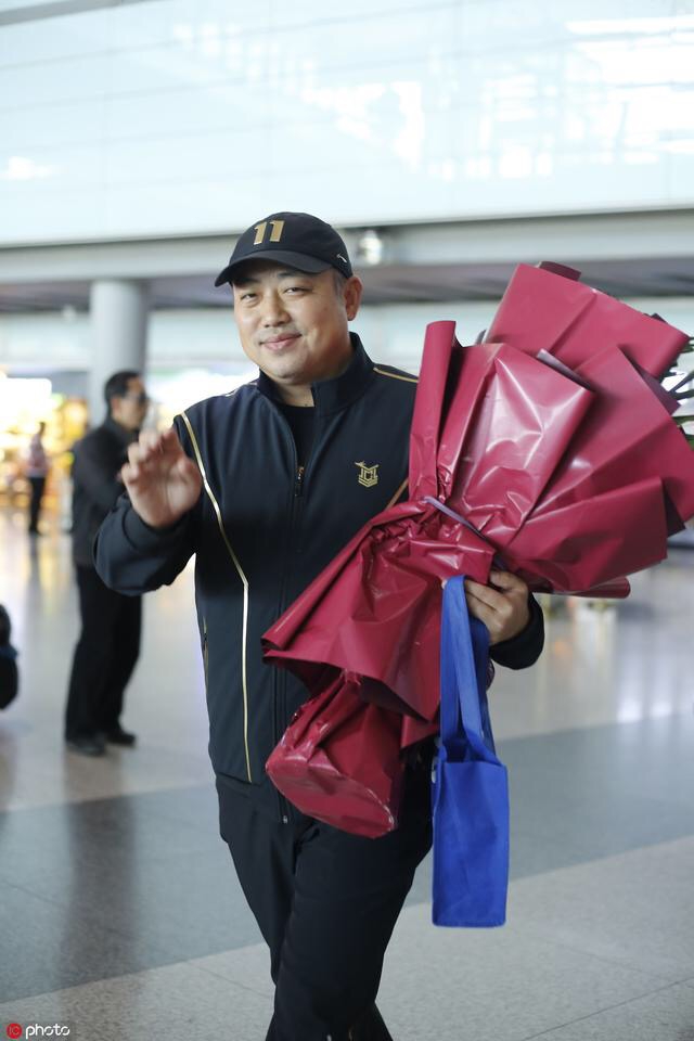 刘国梁率领国乒众将载誉回国