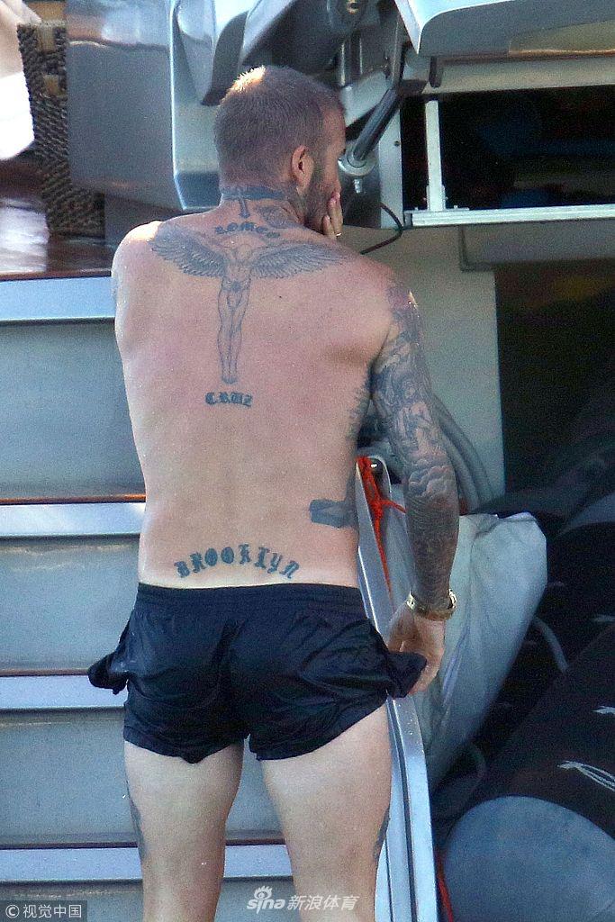 贝克汉姆一家出海亲吻秀恩爱 小七肉腿抢镜