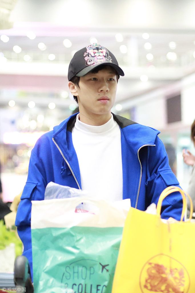 王皓率樊振东林高远回国抵京