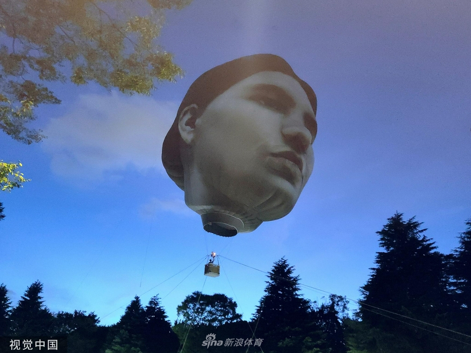 迎奥运 东京公园内出现“巨大人脸”