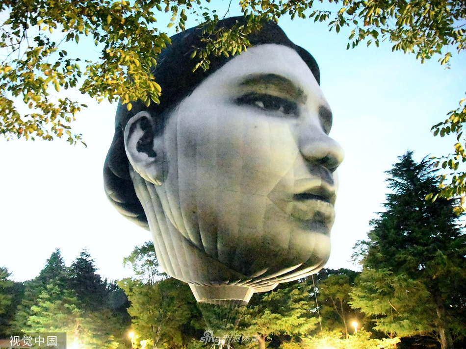 迎奥运 东京公园内出现“巨大人脸”