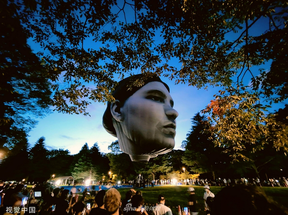 迎奥运 东京公园内出现“巨大人脸”