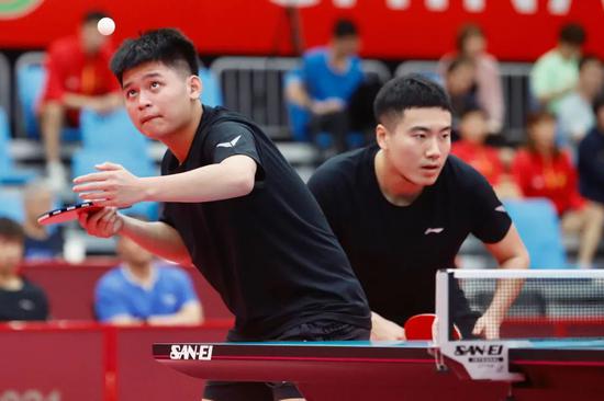 中国乒乓球队热身赛男一团全胜夺冠 女一团输球惊险问鼎
