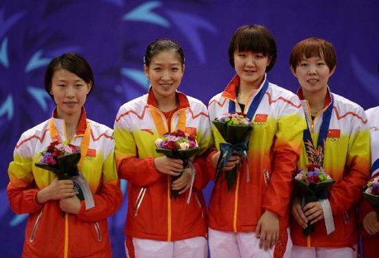 2014仁川亚运会上，中国队包揽乒乓球女子双打前两名。新华社记者韩瑜庆摄