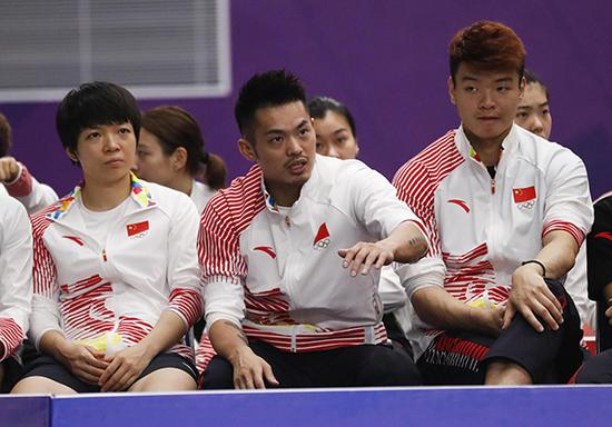 林丹在场外等候。视觉中国 图林丹躺冠?混来的冠军他也不想