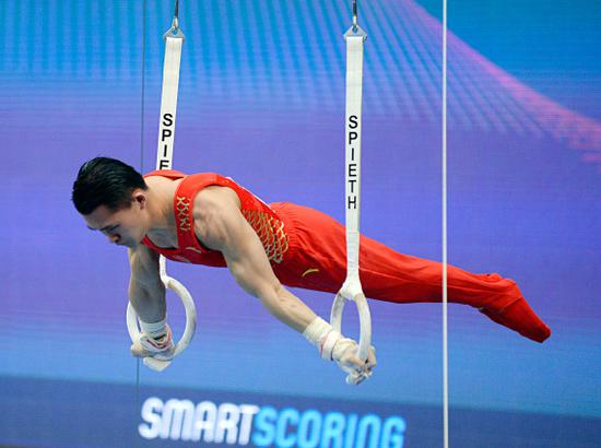 3月12日，中国选手兰星宇在吊环预赛中。当日，为期四天的2020年国际体操联合会世界杯巴库站比赛在阿塞拜疆首都巴库开赛。新华社发（巴巴耶夫摄）