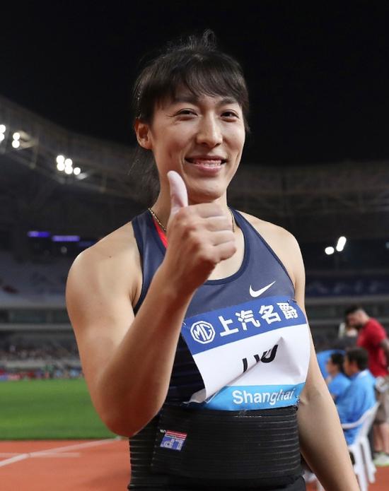 5月18日,中国选手吕会会在比赛后庆祝.新华社记者王丽莉摄