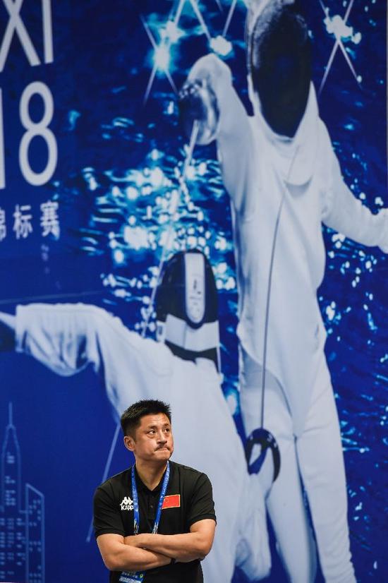 王海滨观战,新华社记者李博摄