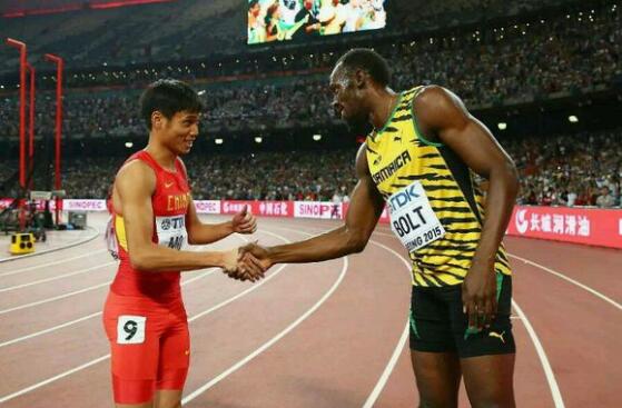 15年世锦赛接力比赛后莫有雪和博尔特握手致意