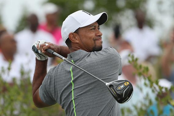 伍兹移动日交出70杆