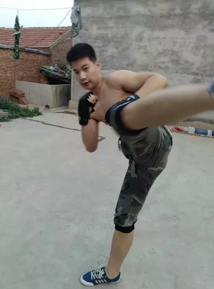 生活中的王光亮热爱搏击