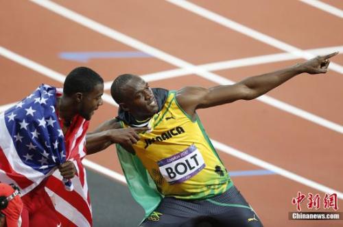 资料图：伦敦奥运会上，博尔特大杀四方。中新社记者 盛佳鹏 摄