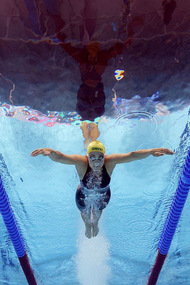 中国选手唐钱婷在女子100米蛙泳以预赛头名身份晋级