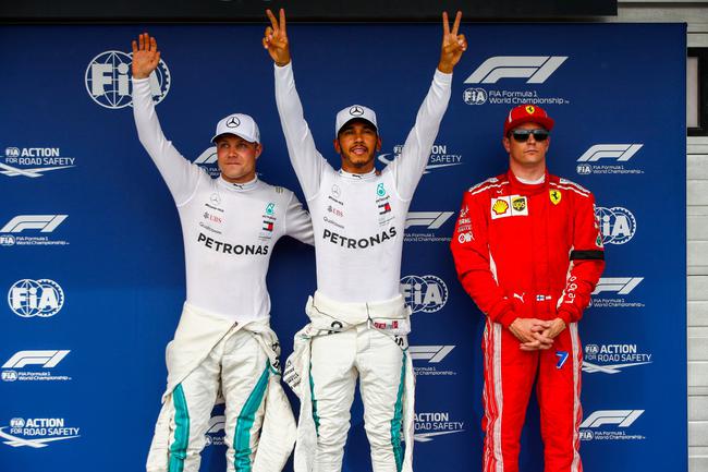 左起：博塔斯、汉密尔顿、莱科宁