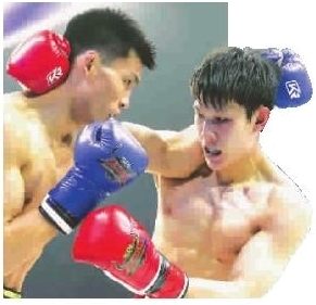 焦道博（左）在比赛中 本报记者 李铭珅 摄