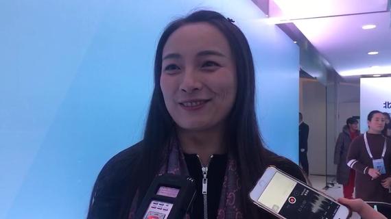 李妮娜：会徽是美好记忆