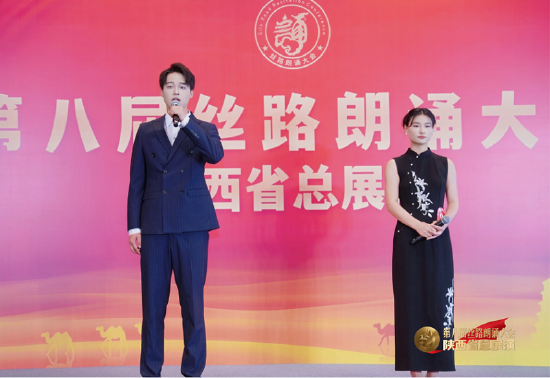 （图十）王欣与胡伊航演绎的《大漠敦煌》