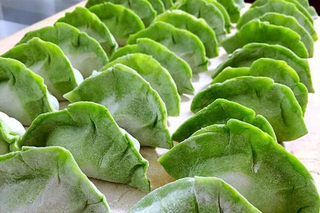 除夕市民日依然采购忙 蔬菜饺子皮最受市民欢迎