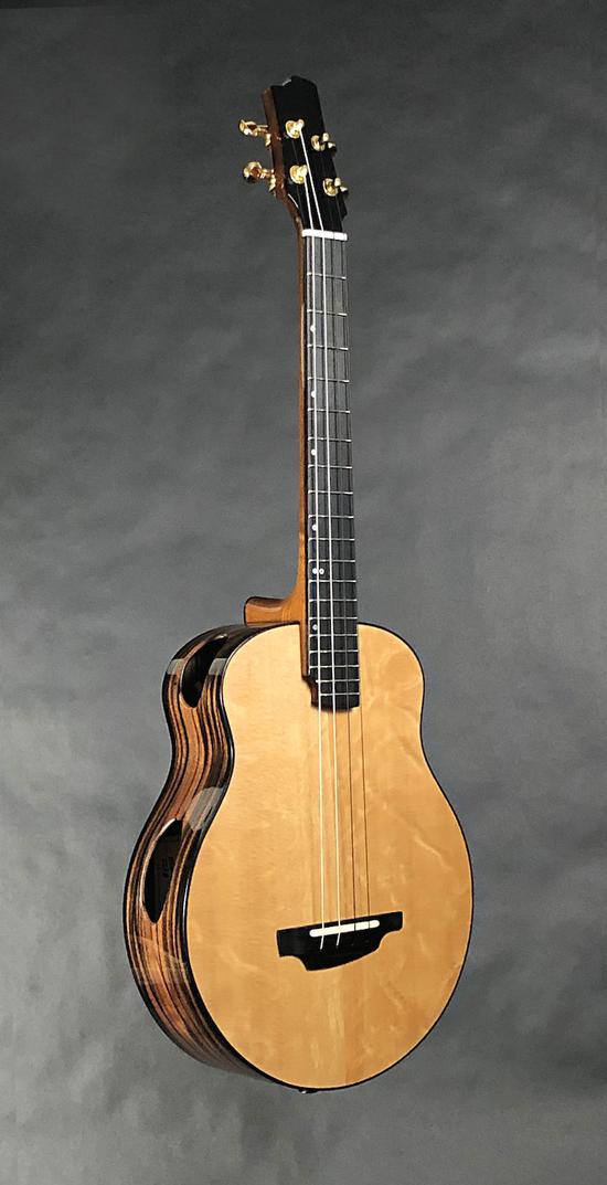 音孔设在侧面的新型吉他