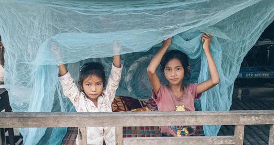 而在此之前，药浸蚊帐必不可少 | WHO， Vlad Sokhin