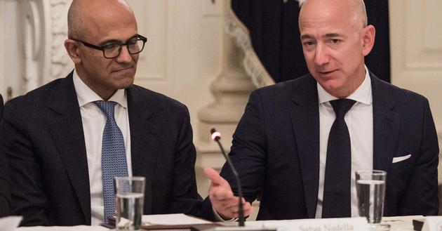 ΢CEOɵ󣩺ѷCEO˹ң