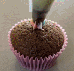 食欲满满的彩虹花纸杯蛋糕gif搞笑图片