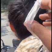 丸子头用来挂零食-搞笑gif动态图片-izike