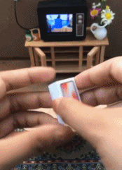 新买的iPhone，mini到了-搞笑gif动态图片-izike