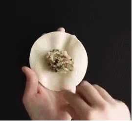 饺子还可以这样包-搞笑gif动态图片 - izike-izike