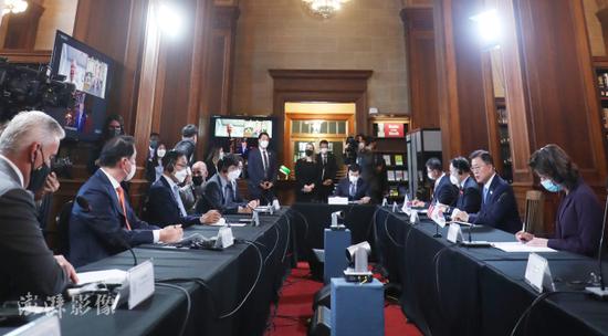 当地时间5月21日，美国华盛顿，韩国总统文在寅出席韩美商务圆桌会议 （图源：澎湃影像）