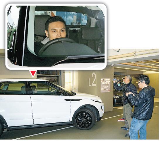 郭可颂驾车返回住所的停车场被记者追访，他没有回避镜头。