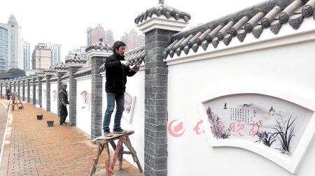 烈士公园东大门现仿古文化墙 粉墙青砖上刊诗文图片