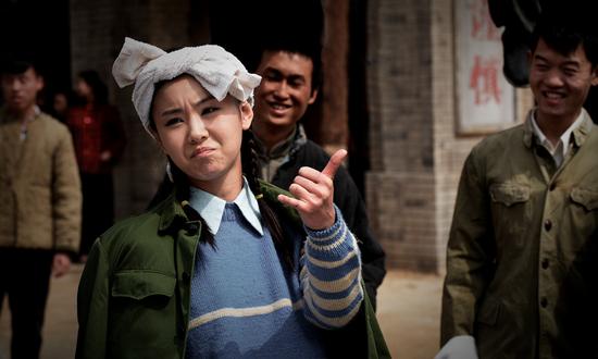 李小萌饰演田晓霞