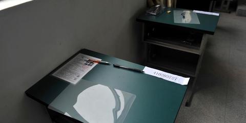 枪手揭内幕:因拮据替考挣钱