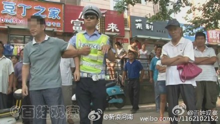 郑州男子质疑交警贴条 因说太缺德被带走