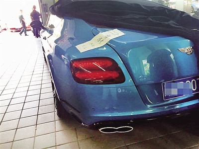 顾先生的宾利车目前封存在宾利重庆4S店维修车间。