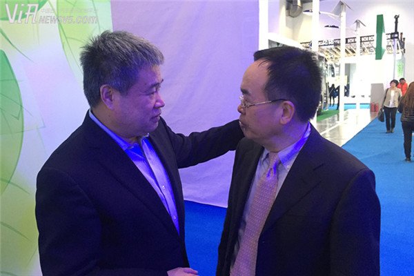寰球汽车集团董事长吴迎秋与中国电工技术学会副理事长兼秘书长裴相精