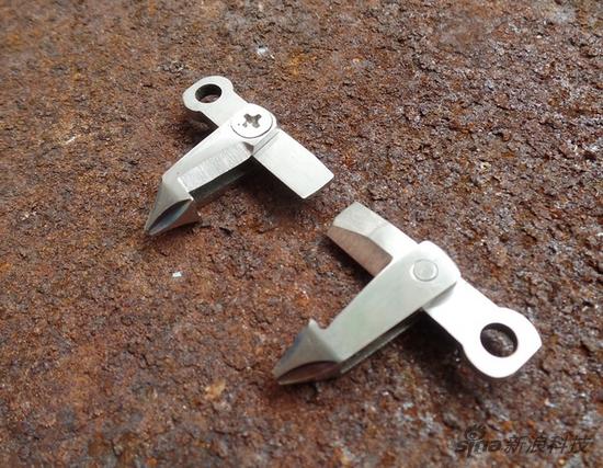 远看是拉链头近看是个多用工具