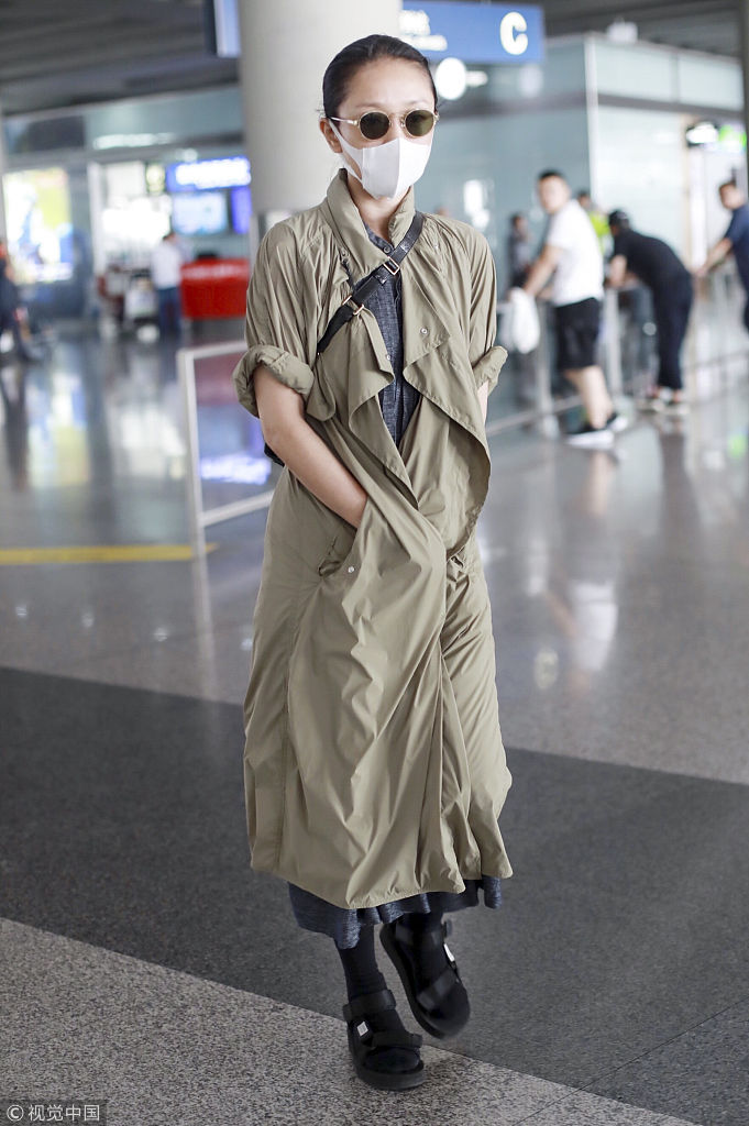 周迅亮相机场. 图片来源