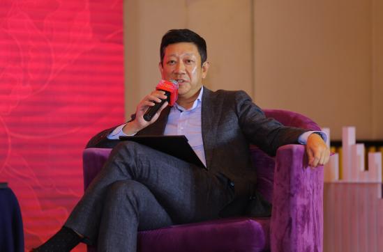 (上海实业集团副总裁周雄博士)