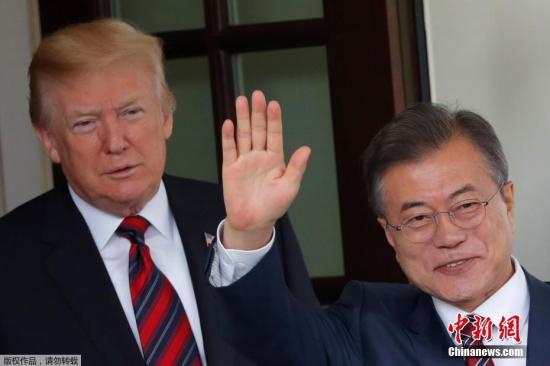 资料图：韩国总统文在寅与美国总统特朗普的第五次会晤。