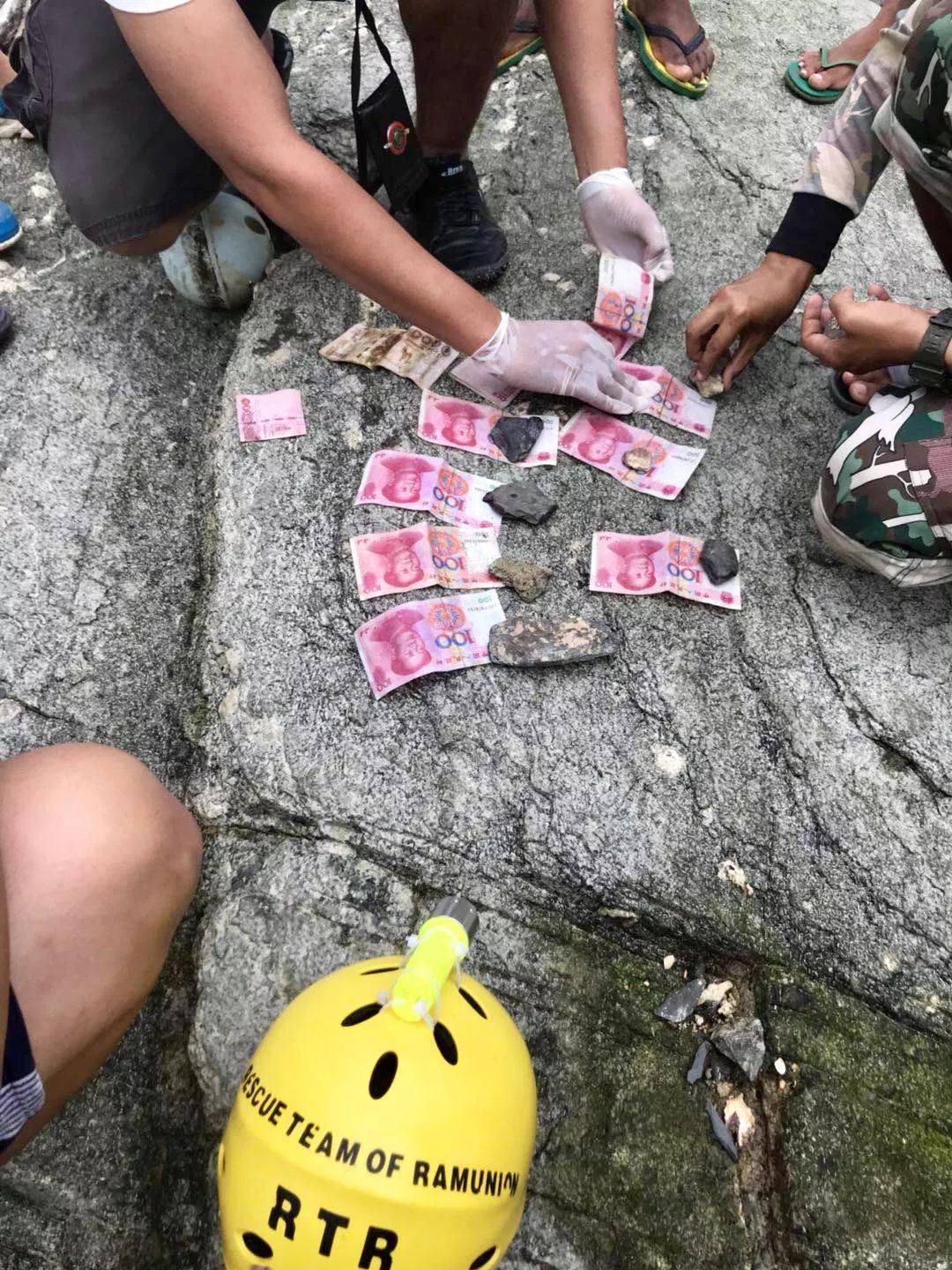 最后发现的遗体身上的人民币,沉船遇难者的身份由此基本确认.