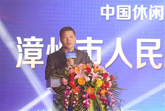 漳州市副市长陈水树,龙海市委书记郑隆松,中国食品报社副总编辑粘新