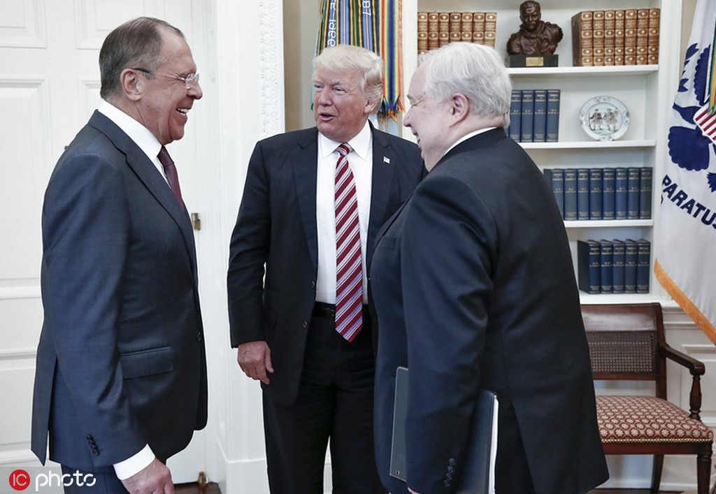 2017年5月10日，特朗普在白宫会见俄外长拉夫罗夫及时任俄驻美大使基斯利亚克 图源：IC Photo