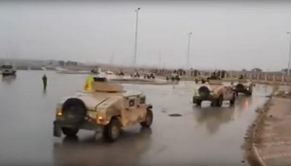 资料图：叙利亚库尔德武装展示其由150辆悍马组成的车队。