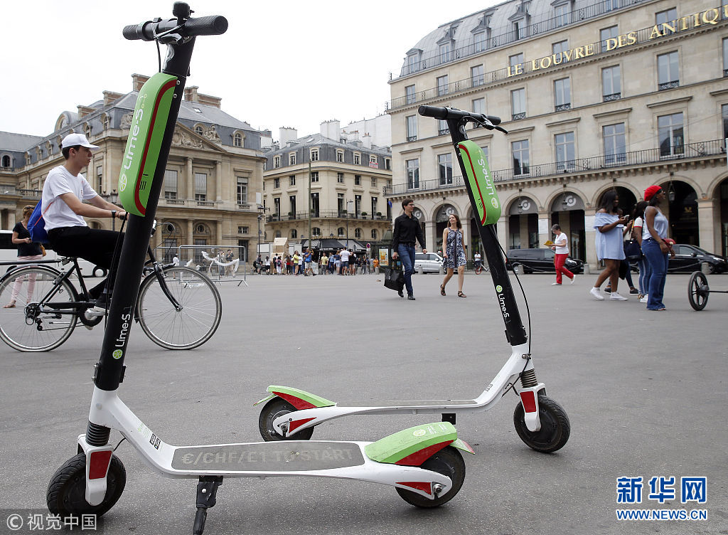 法国街头现共享电动踏板车民众热捧组图